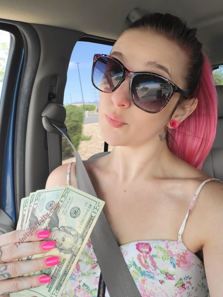 Princess Trinity sunglasses money in hand in car